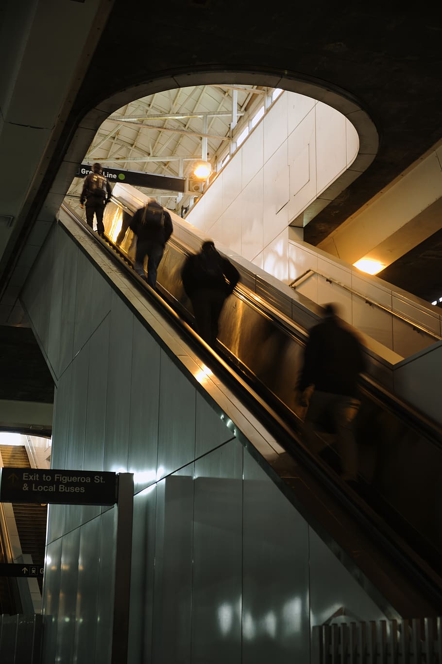 four people on escalator inside building, handrail, banister HD wallpaper