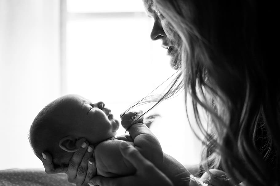 woman holding baby, mom, hair, parent, newborn, window, monochrome