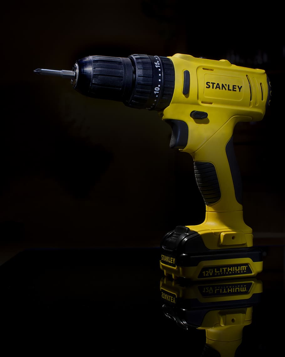 yellow and black Stanley cordless hand drill, power drill, tool