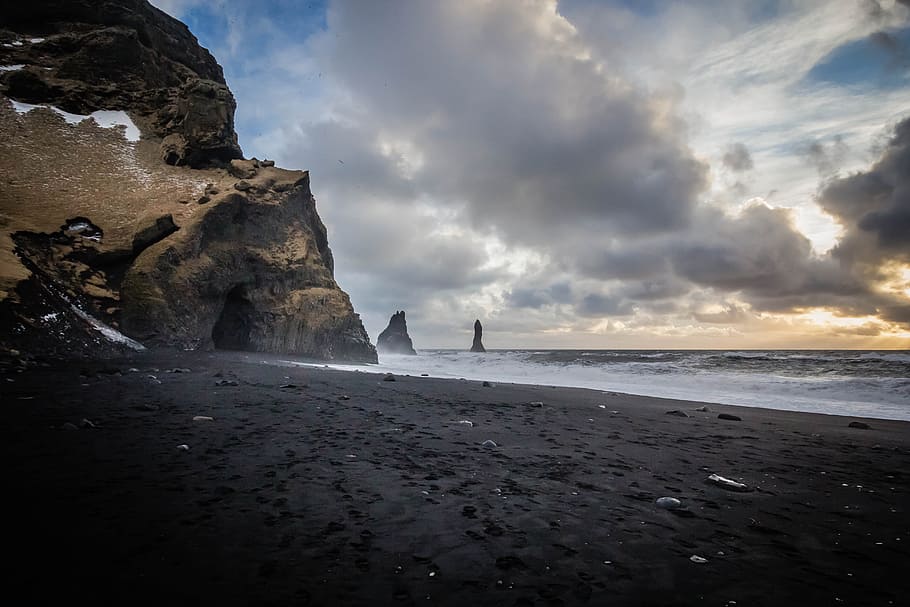 Photo Of Sea Near Cave, beach, black sand, clouds, iceland, island HD wallpaper