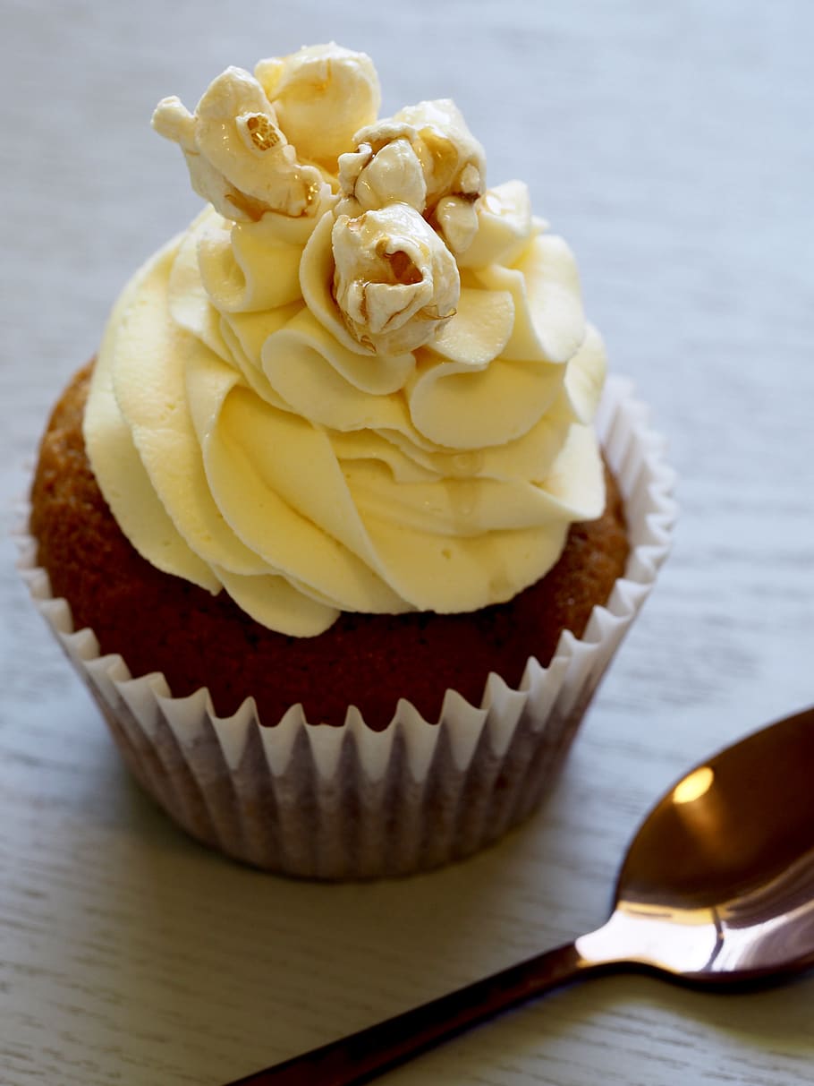 Chocolate Cupcake With Yellow Icing On Top, bake, bakery, baking HD wallpaper