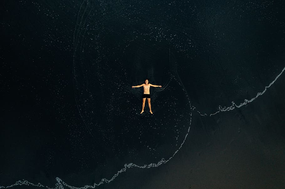 man lying on water, one person, full length, rear view, real people HD wallpaper