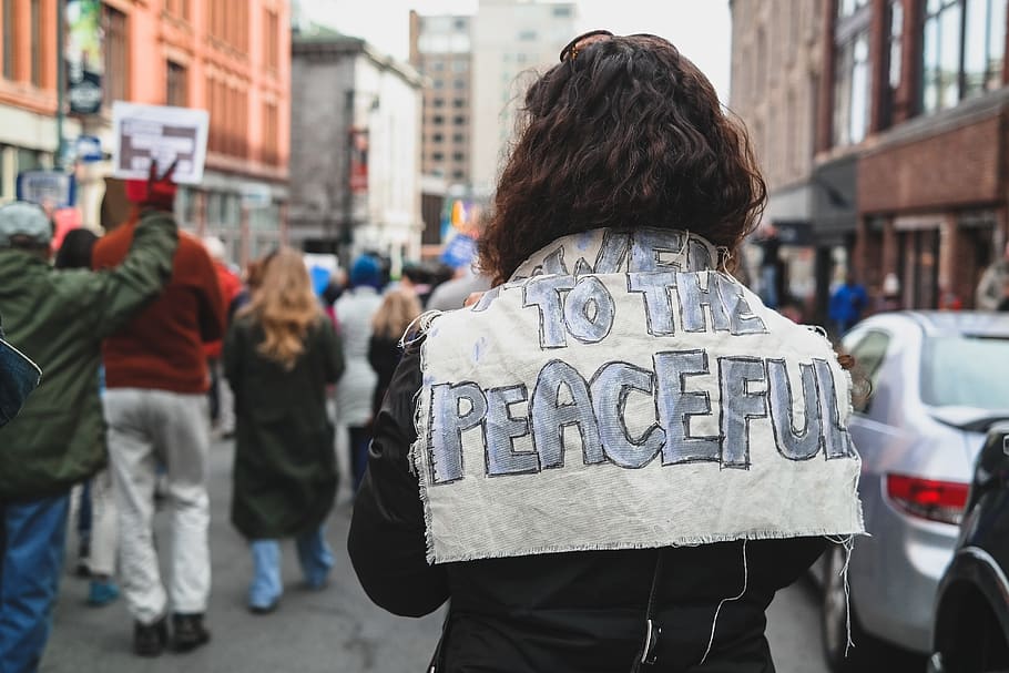 woman with to the peace signage at her back facing people, human, HD wallpaper