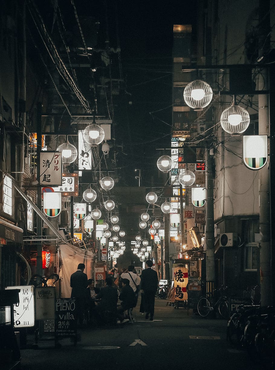 people walking on street betweein lamps, alley, city, light, sign, HD wallpaper