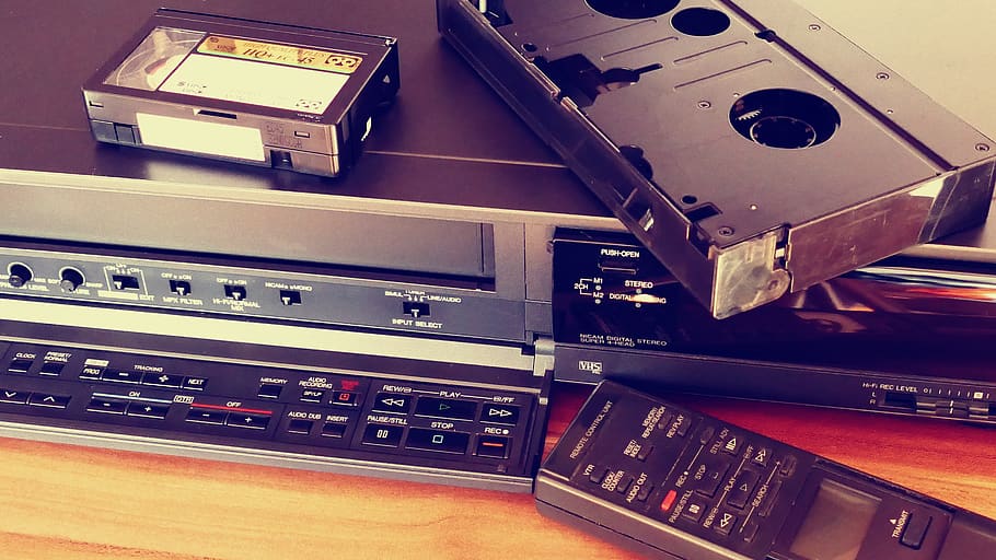 Black Vhs on Vhs Player Beside Remote Control, classic, phonograph record