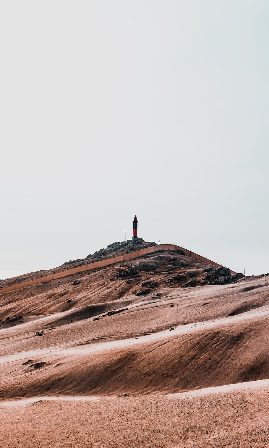lighthouse on hill during daytime, nature, outdoors, soil, sand HD wallpaper