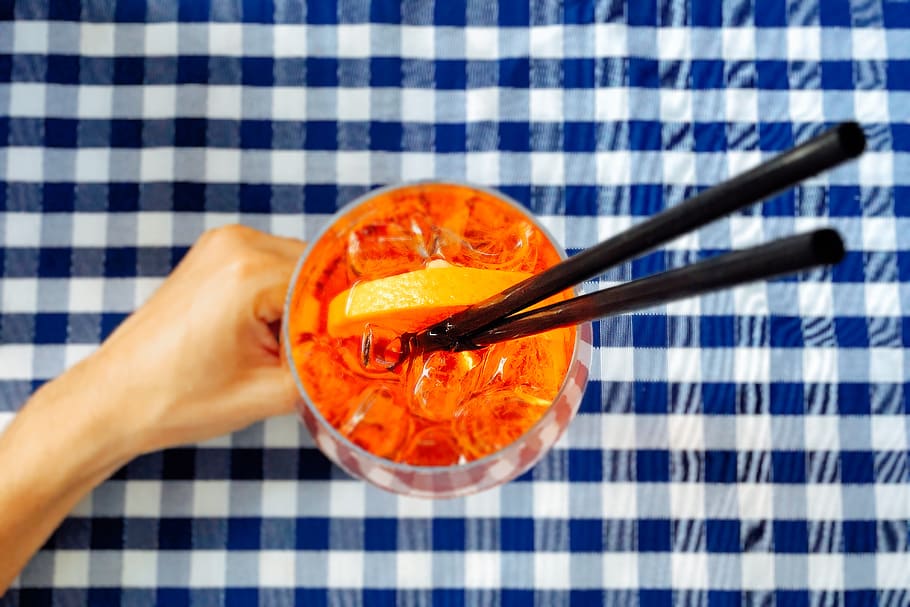 Person Holding Clear Drinking Glass With Two Black Straws, beverage HD wallpaper
