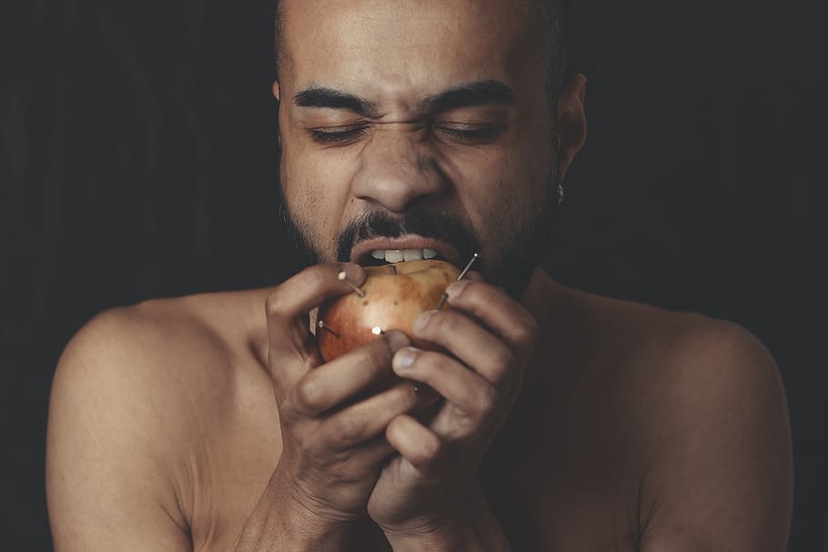 Man Biting Apple Fruit, close-up, eyes, facial expression, facial hair HD wallpaper
