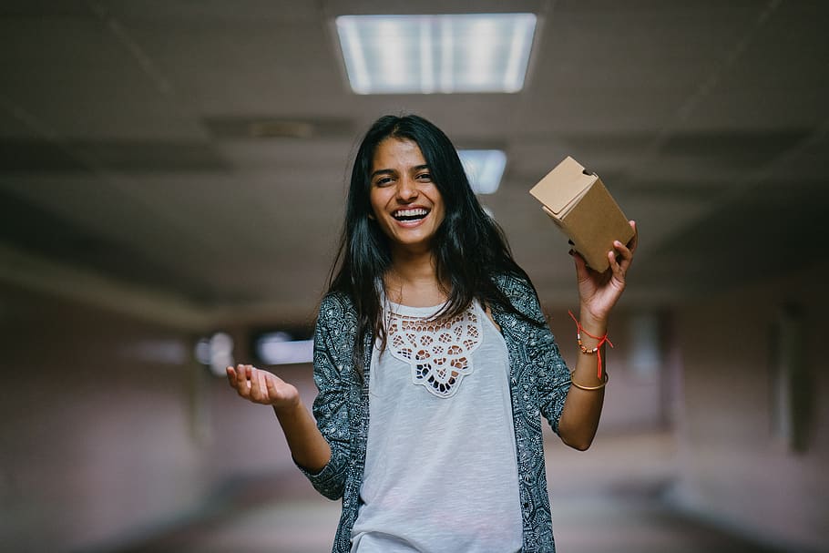 Woman Holding Brown Cardboard Box, blur, enjoyment, facial expression, HD wallpaper