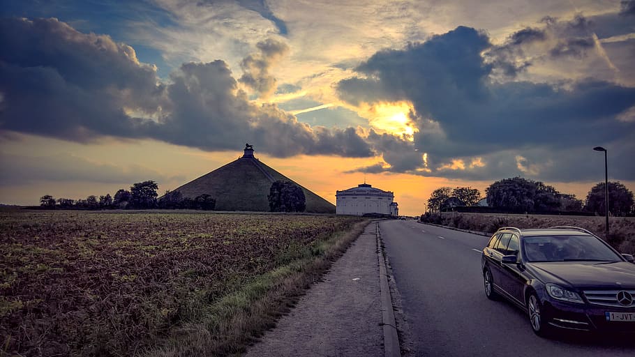 belgium, waterloo, clouds, road, lion, grass, car, mound, sky HD wallpaper