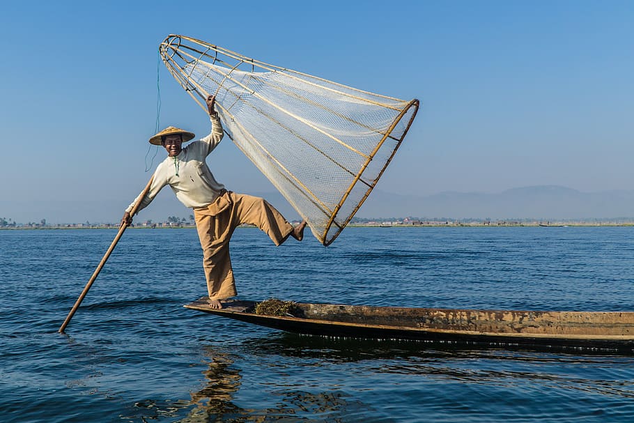 man holding stick and cone-shaped fishing net, men, nautical vessel, HD wallpaper