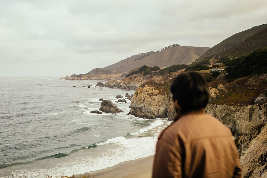 sea, beach, hills, sunny, waves, big sur, alone, thinking, guy HD wallpaper