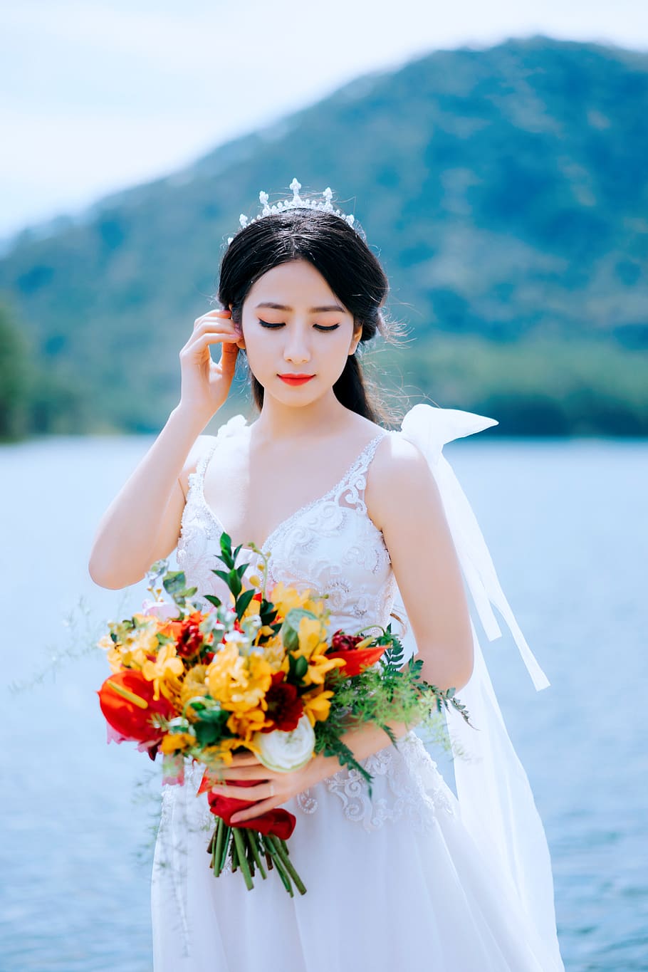 Woman Wearing Wedding Dress While Holding Her Hair, beautiful