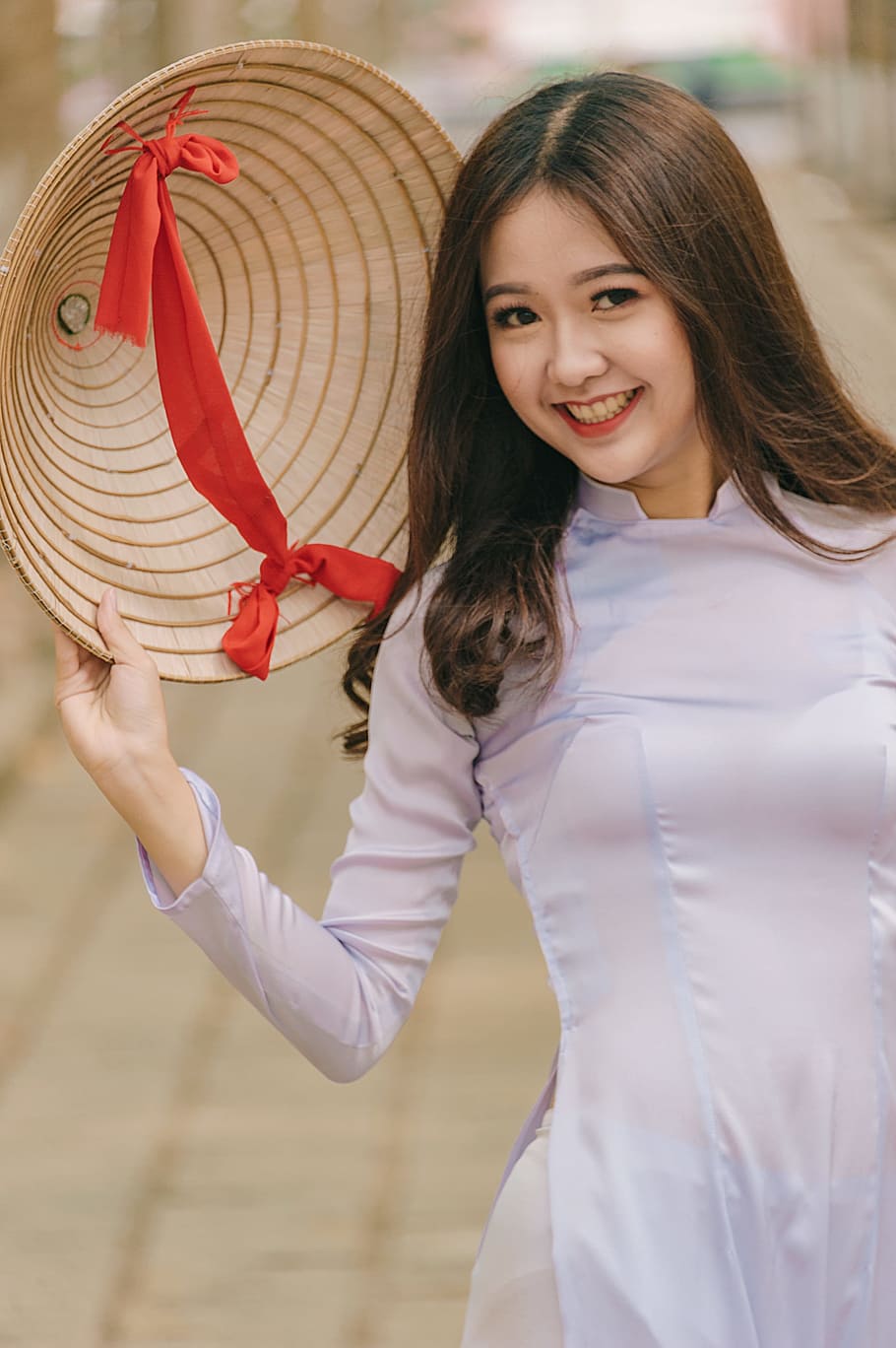 Woman Holding Hat, beautiful, blurred background, cute, daylight HD wallpaper
