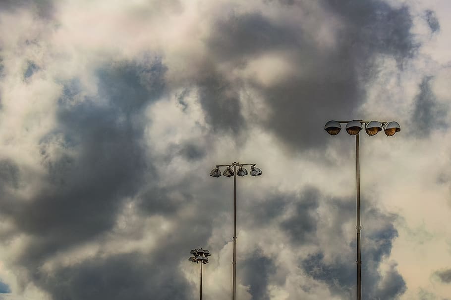floodlight, clouds, lamps, storm, stormy weather, lights, winter HD wallpaper