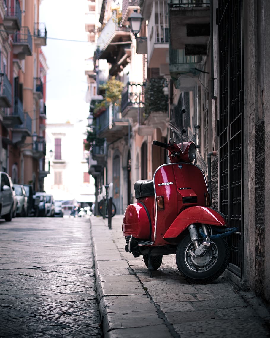 parked red motor scooter, automobile, vehicle, car, transportation