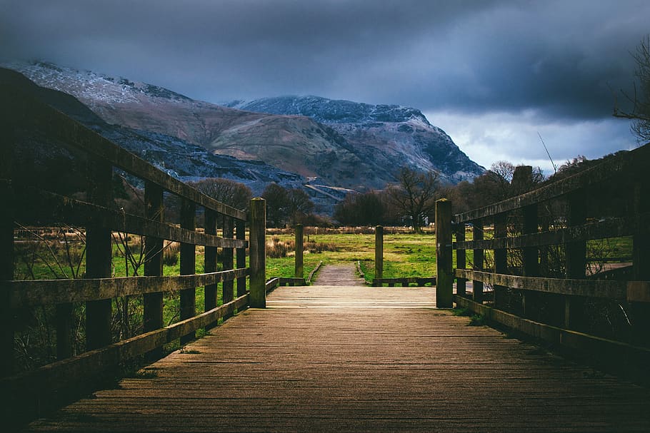 Brown Wooden Bridge Near Mountain at Daytime, clouds, cloudy HD wallpaper