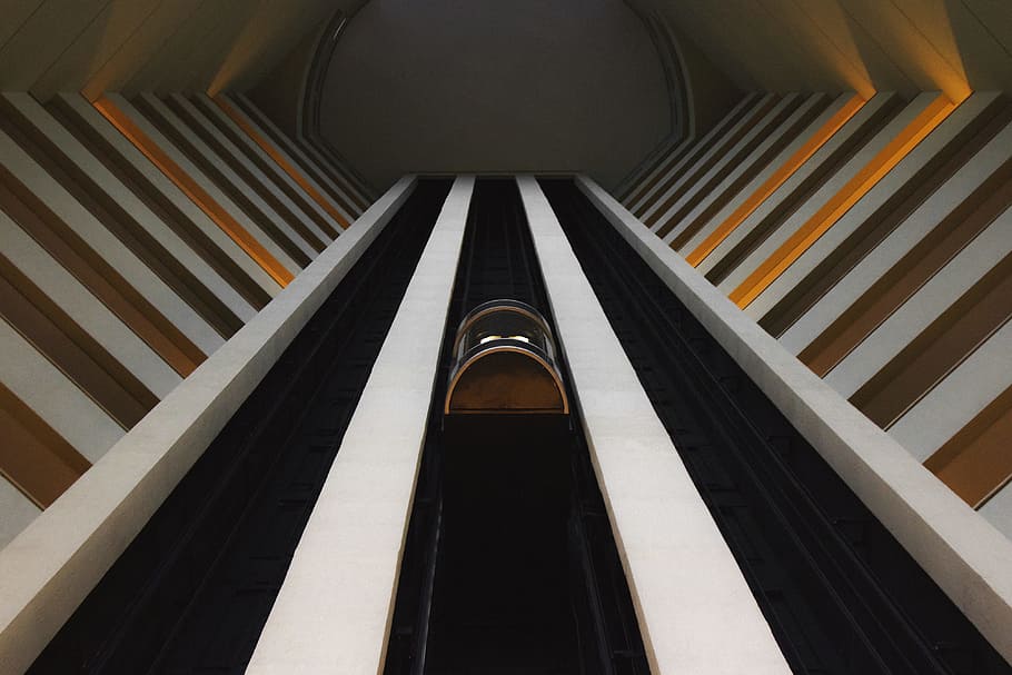 low angle photography of building interior, elevator, structure HD wallpaper