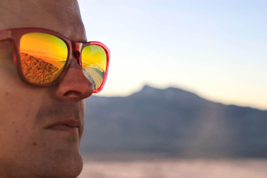 looking, glasses, focus, mountain, sky line, person, face, man HD wallpaper