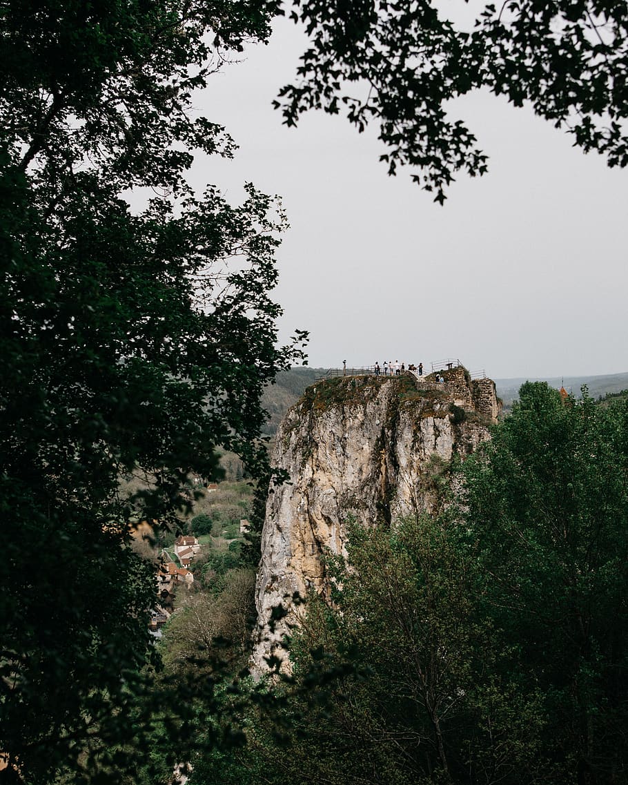 Rock Formation over the Trees, adventure, cliff, daylight, green HD wallpaper
