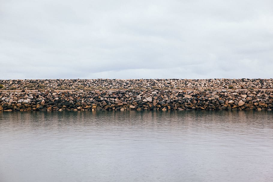Rocky Sea Dock, dam, ocean, rocks, stones, water, sky, cloud - sky HD wallpaper