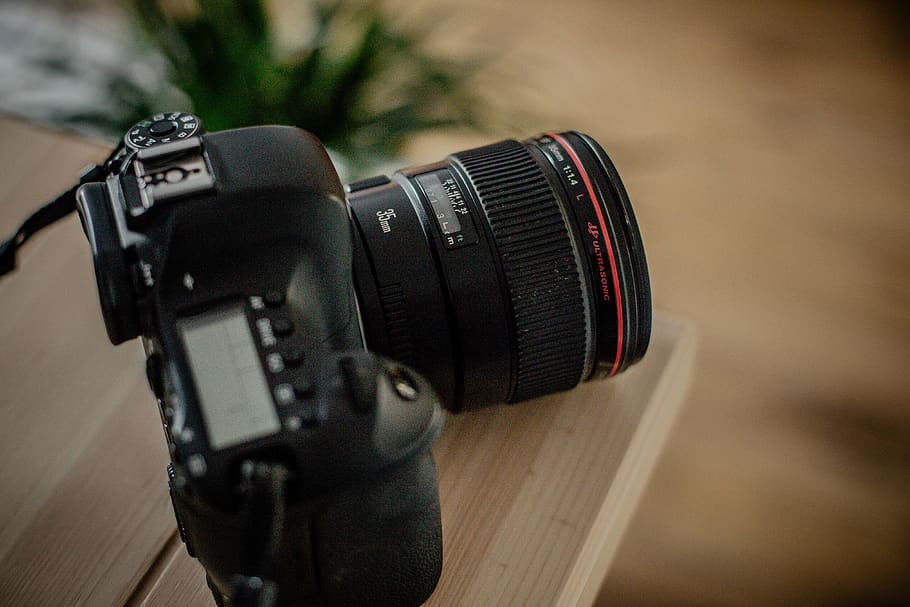 black DSLR camera, electronics, camera lens, wristwatch, 35mm lens HD wallpaper