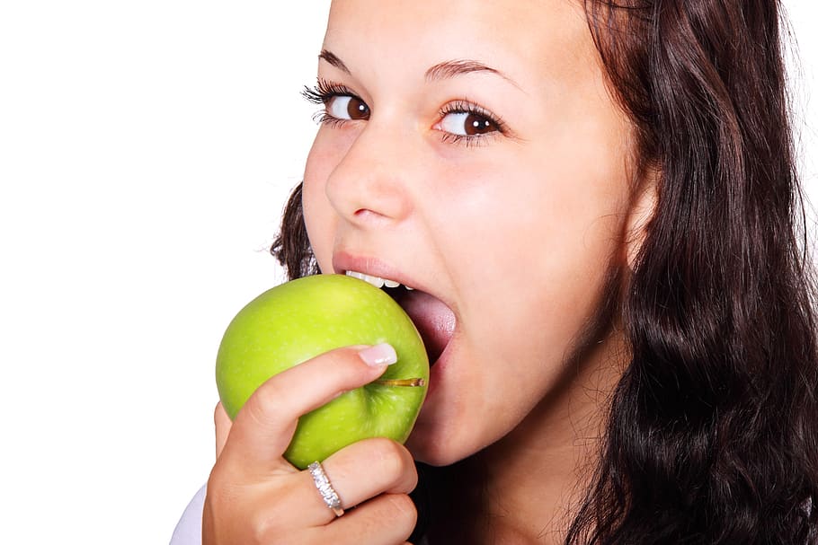 Woman Wearing Silver Diamond Ring Biting Green Apple, bite, eating HD wallpaper