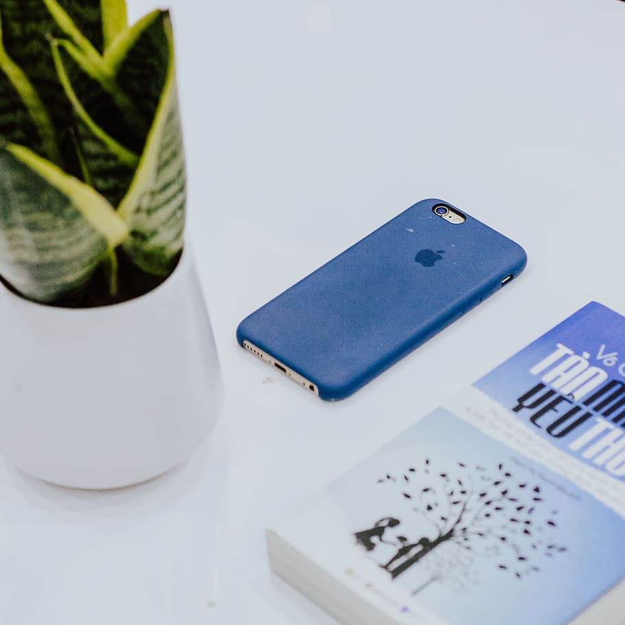 silver iPhone 6 beside book, no people, table, still life, indoors HD wallpaper