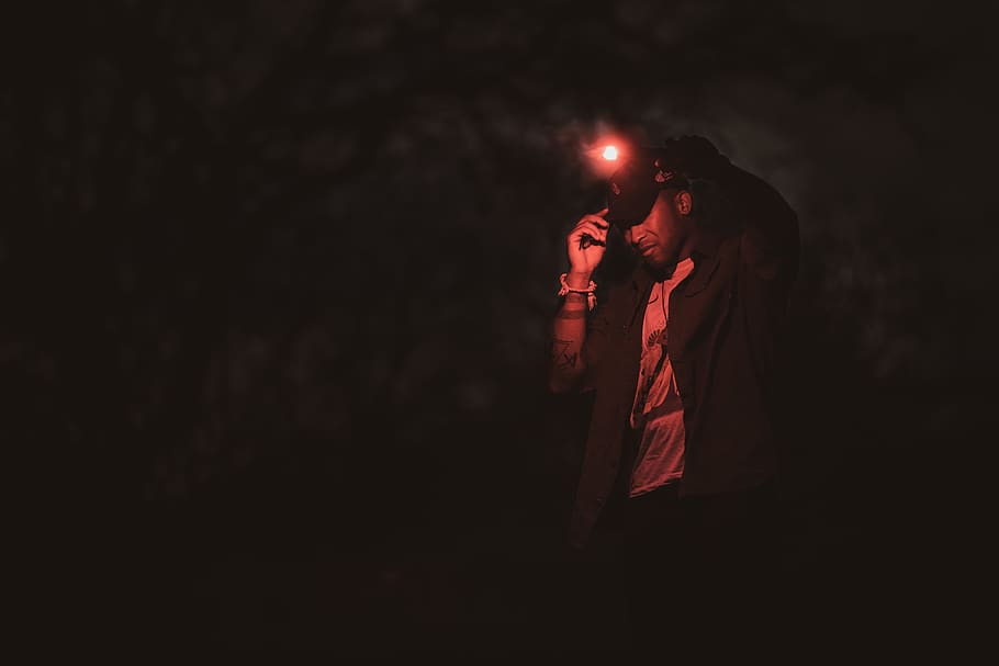 man with a flashlight headset, night, adult, two people, young adult HD wallpaper