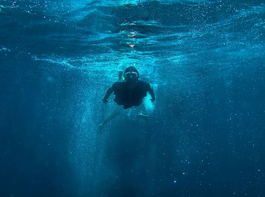 man free diving under water, person, human, outdoors, sport, sports