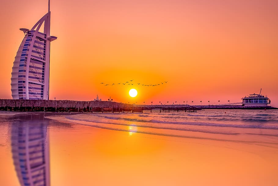 sea, sunset, romantic, dubai, water, sky, architecture, reflection HD wallpaper