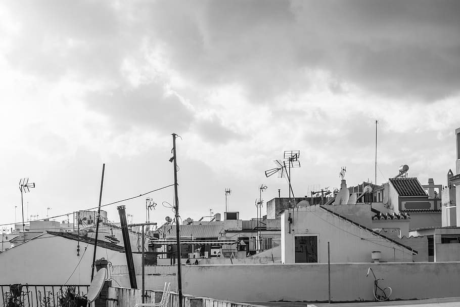 roofs, sky, clouds, storm, overcast, terrace, antenna, cable HD wallpaper