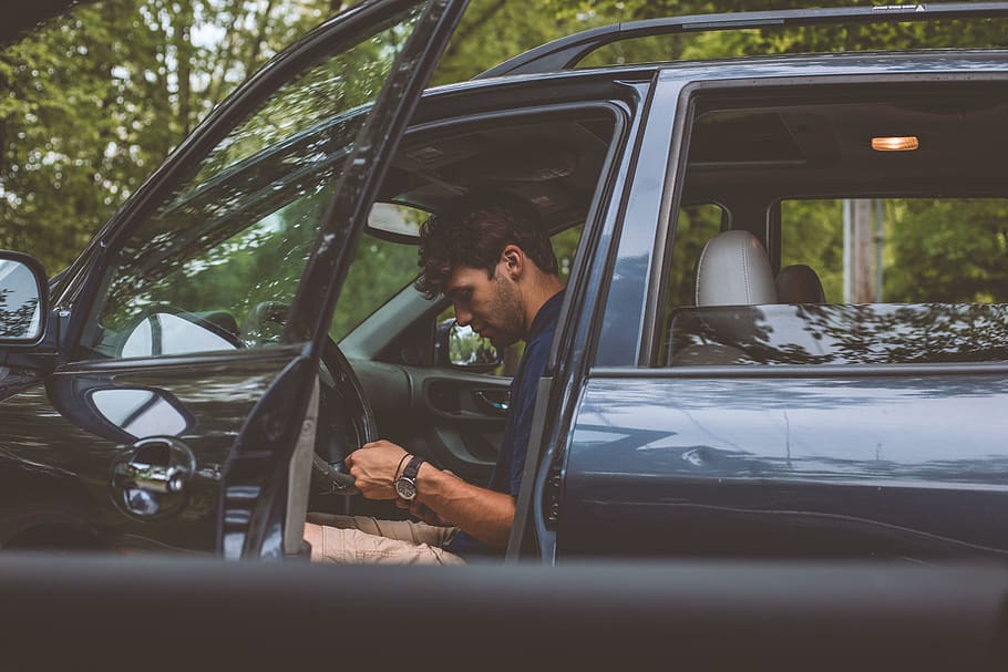 Man Sitting Inside Vehicle, car, car lights, daylight, driver HD wallpaper