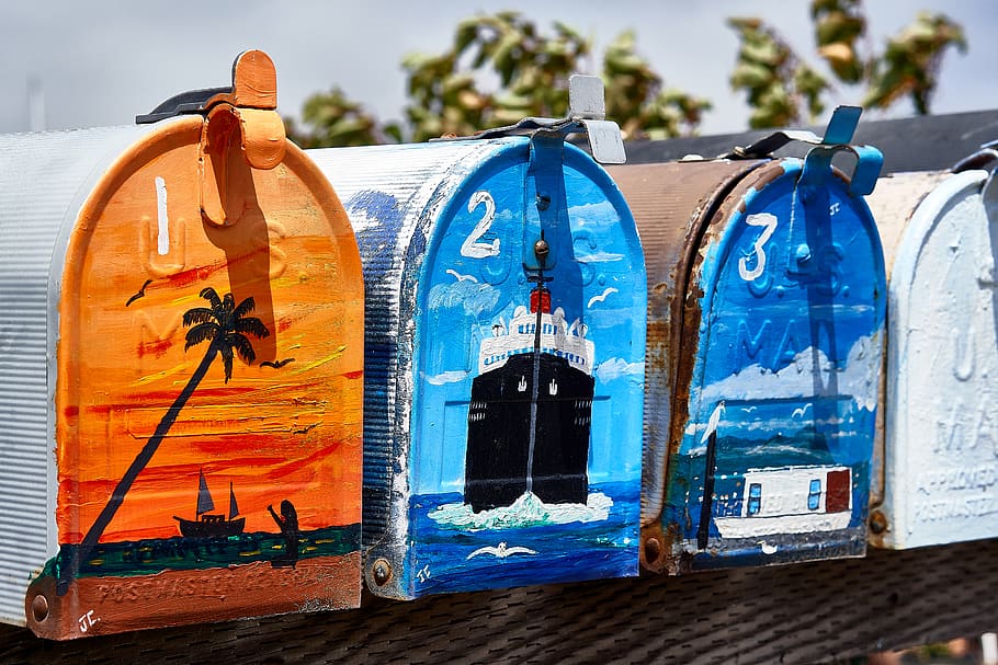 four assorted-color mailboxes on black surface, no people, architecture HD wallpaper
