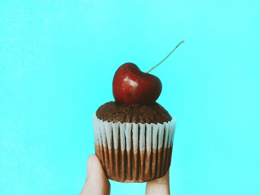 Person Holding Chocolate Cupcake With Cherry Topping, berry, close-up, HD wallpaper