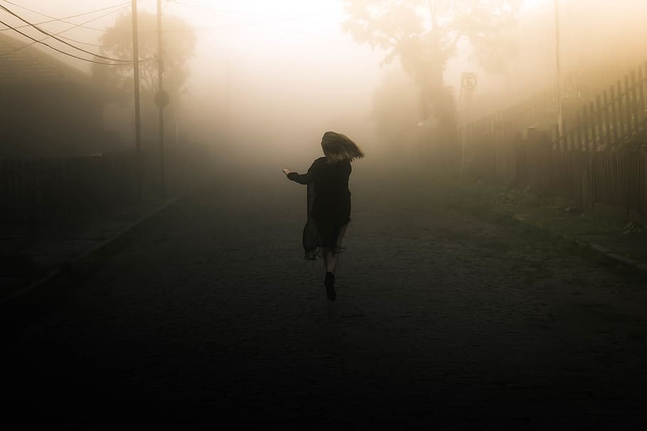 Photo of Woman Running on Road, back view, female, fog, foggy