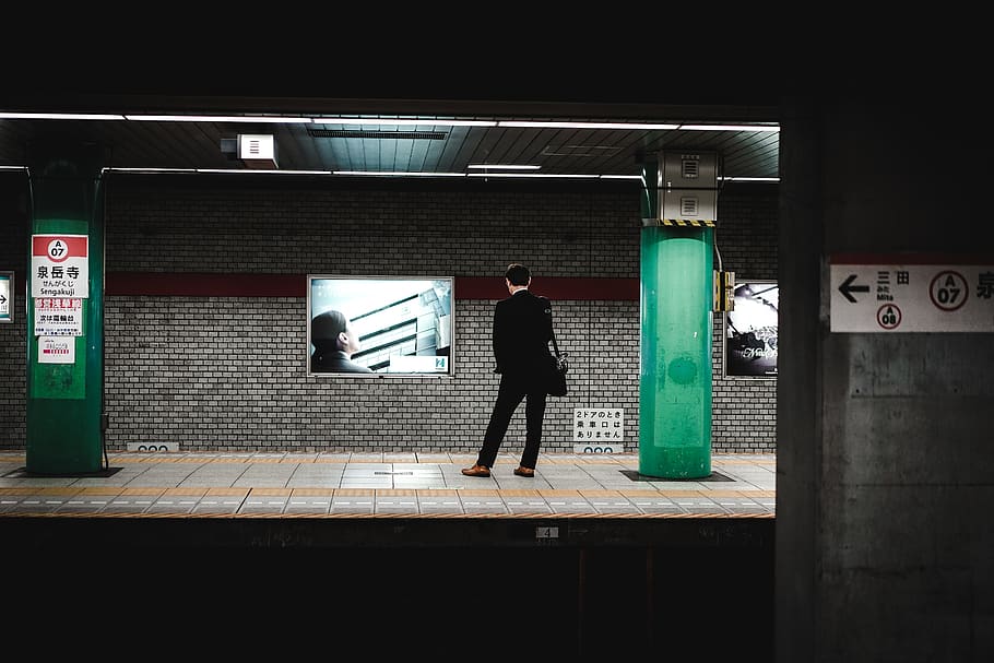 person standing inside train station, architecture, one person HD wallpaper