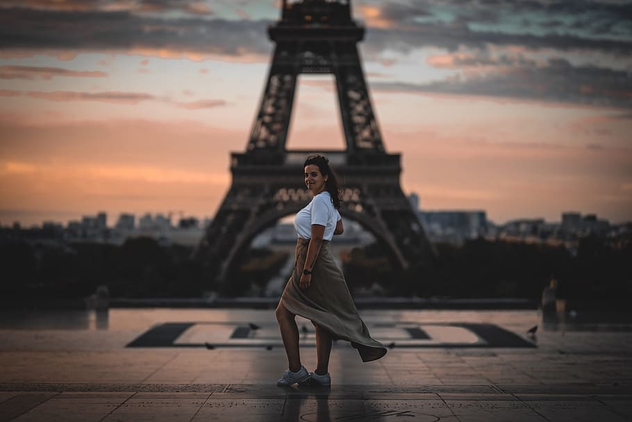 selective focus photography of woman standing in front of Eiffel Tower, Paris, HD wallpaper