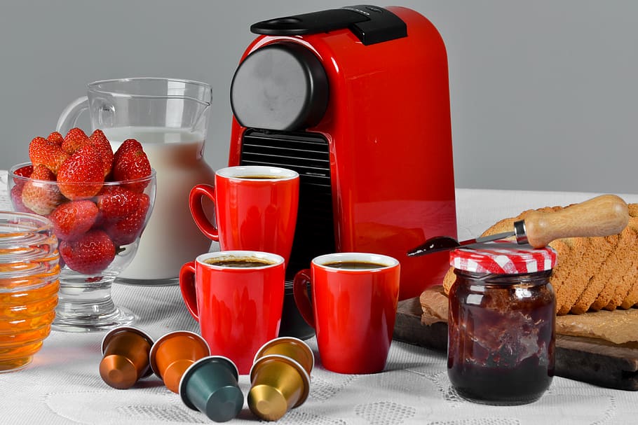 Red Ceramic Mug Filled With Coffee Near Jam Jar on Table, beverage