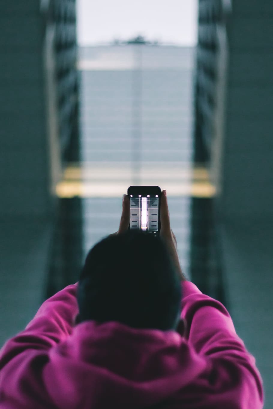 selective focus photography of person using smartphone, iphone