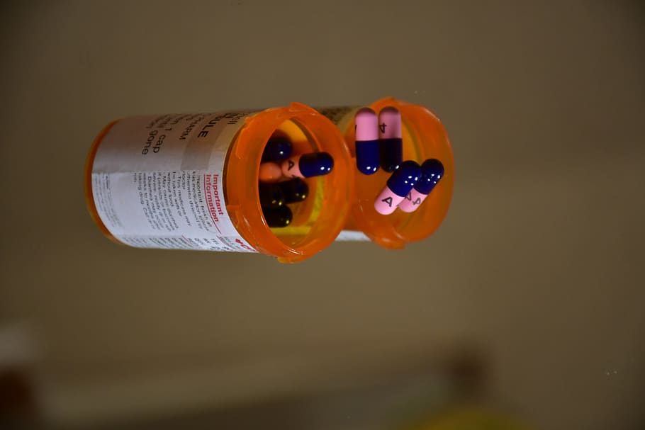 toy, medication, bottle, pill, sphere, finger, plastic, teen HD wallpaper