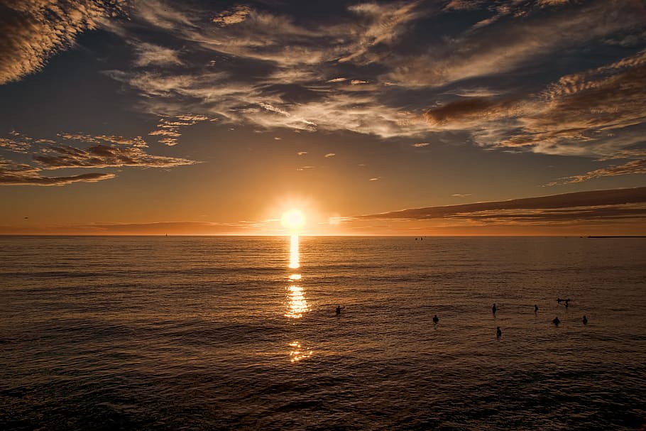 sunset over a beach, flare, light, sunlight, nature, outdoors HD wallpaper