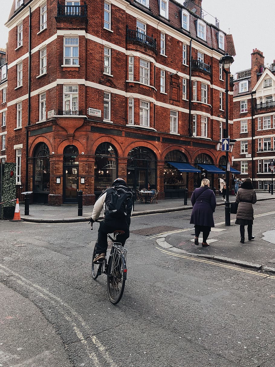 Person Riding Bicycle, architecture, building, city, cyclist HD wallpaper