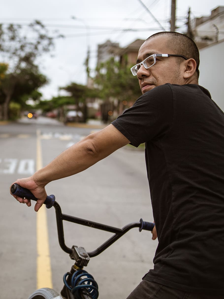 man riding bicycle, person, human, bike, transportation, vehicle HD wallpaper