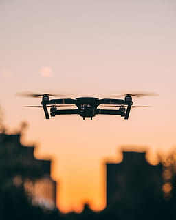 selective focus photography of quadcopter drone in mid-air, mavic HD wallpaper