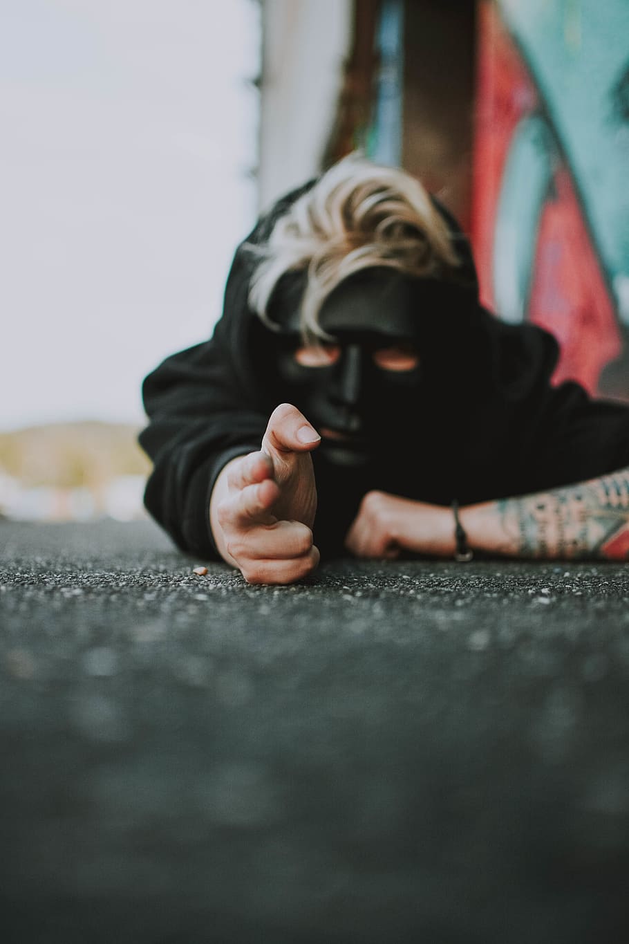 Man Laying On Ground, creepy, hand, mask, person, one person HD wallpaper