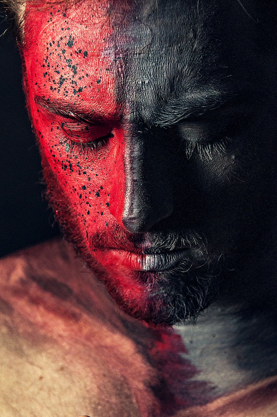 man portrait red and black paint, face, person, human, head, skin
