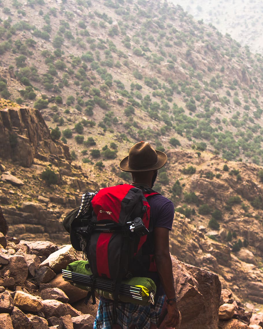 man hiking on brown mountain, person, nature, human, people, adventure HD wallpaper