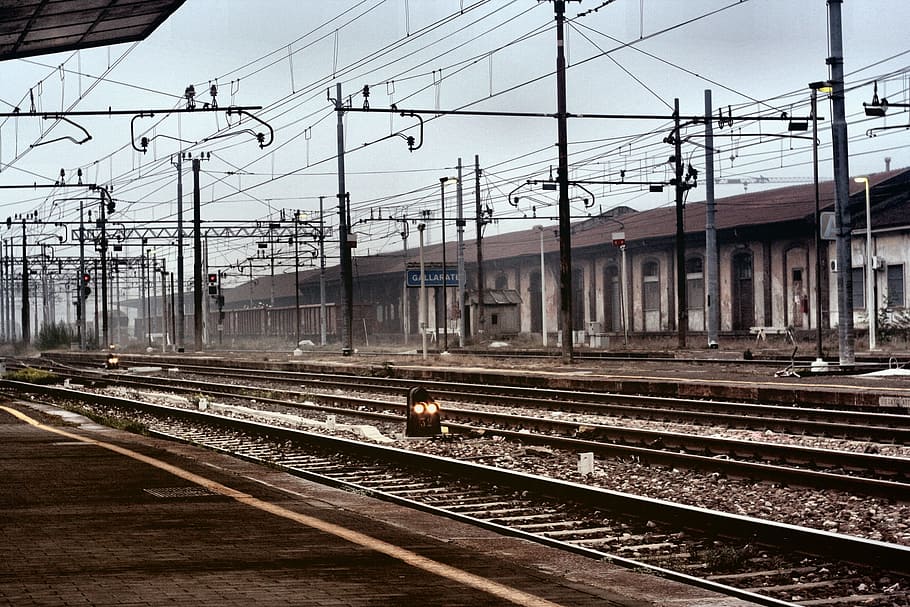 View OF Electricity wires and rail track in Italy, industrial