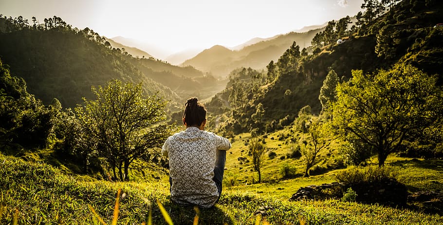Photo of Person Sitting On Grass, adventure, back view, dawn HD wallpaper